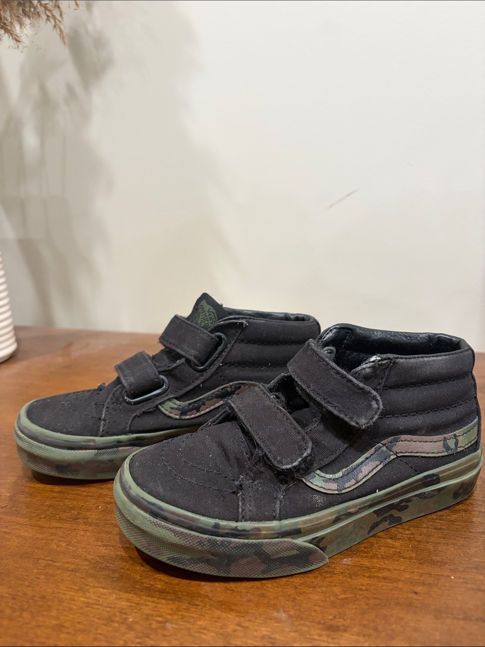 Vans Kids Black High-Top Sneakers with Green Camo Accents